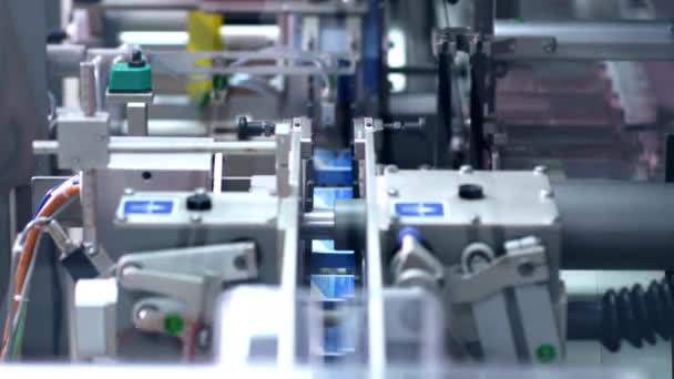 Packaging line at pharmaceutical factory. Medical drugs on packaging machine - Footage, Video