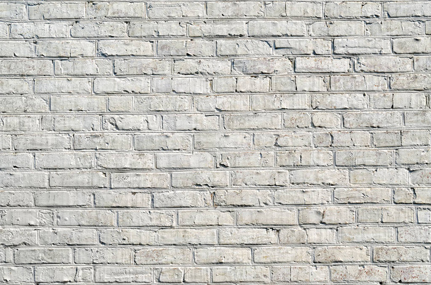 Texture of a brick wall painted with white paint. - Photo, Image
