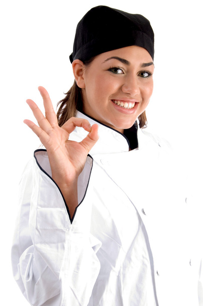 Beautiful female chef showing ok sign - Фото, зображення