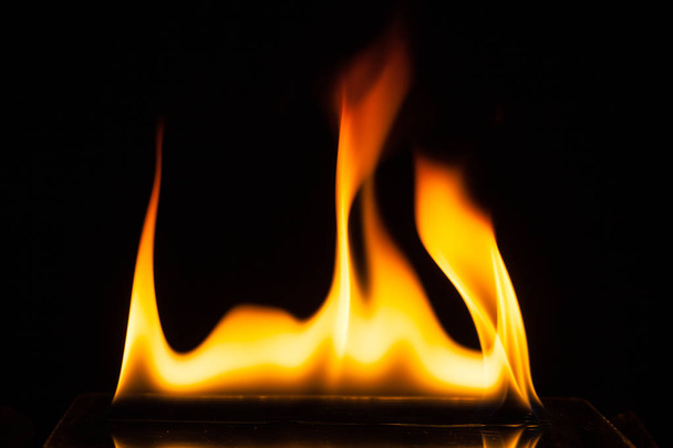 blaze of fire isolated on black ground - Fotó, kép