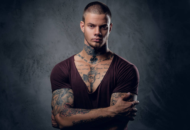Tattooed male over grey  - Photo, Image