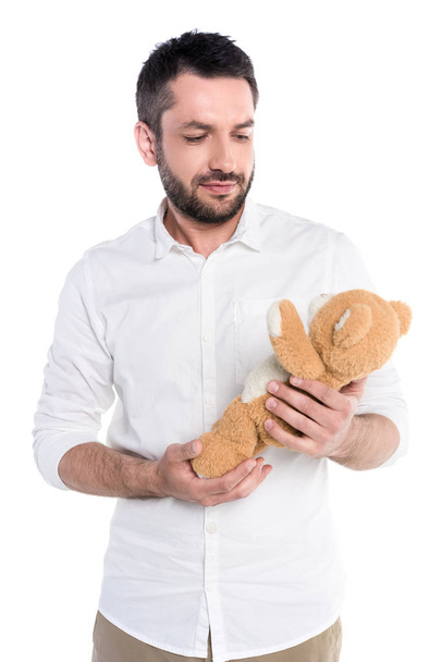 Man holding teddy bear - Photo, Image