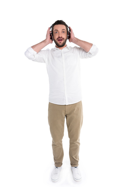 Surprised man in big headphones  - Foto, Imagem