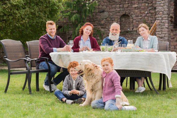 family having dinner at countryside - Fotografie, Obrázek