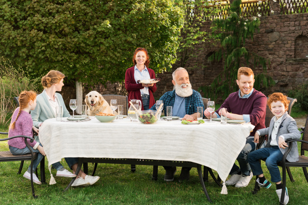 family having dinner at countryside - Fotoğraf, Görsel