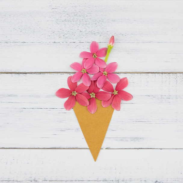 Pink flower ice cream on white wood background - Foto, imagen