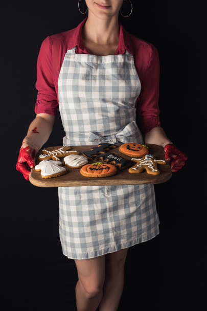 Girl gazdaság halloween cookie-tálca - Fotó, kép