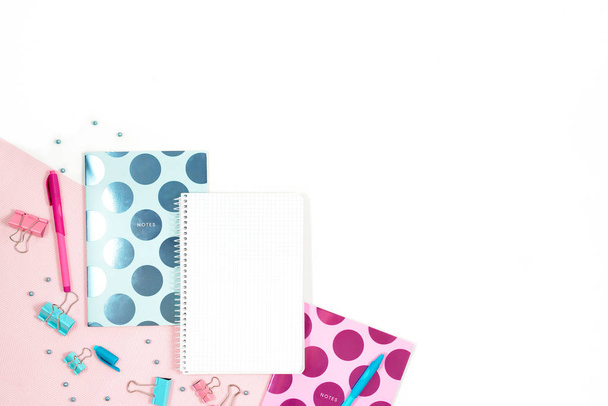 Flat lay photo of office white desk with tablet and stylish pink blue notebook copy space background - Zdjęcie, obraz