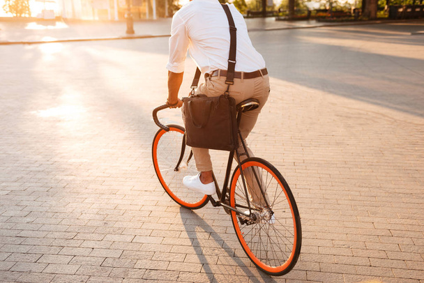 Handsome young african man early morning with bicycle - Fotoğraf, Görsel
