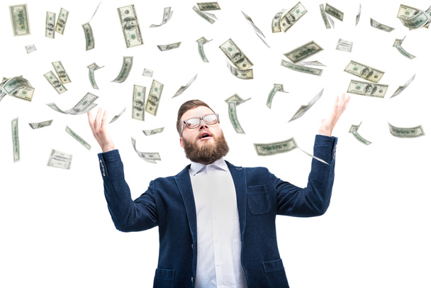 Бизнесмен с долларовыми банкнотами
 - Фото, изображение