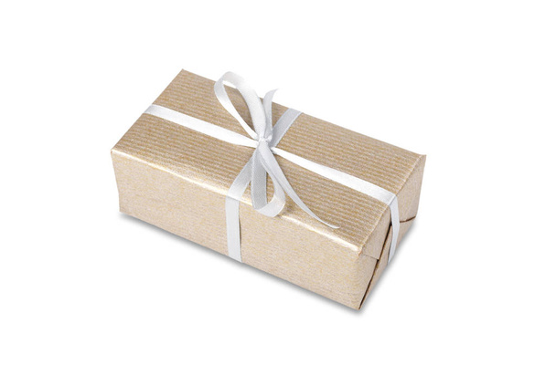 Christmas holiday gift box in golden paper isolated on white - Foto, imagen