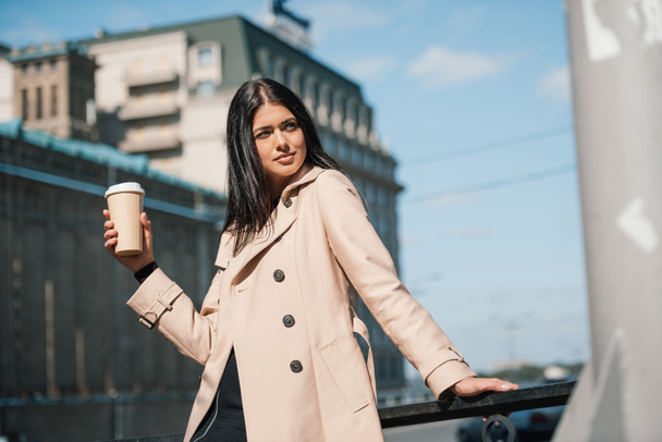 woman with coffee to go - Фото, изображение