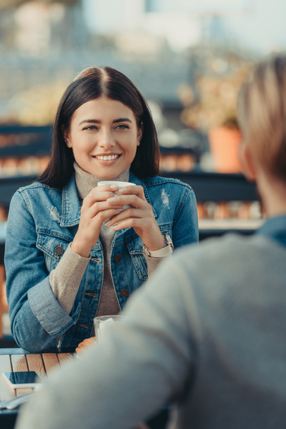 woman drinking coffee with boyfriend - Photo, Image