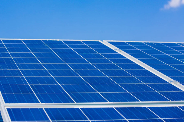 Solar panels on the sky background. Solar power plant. Blue solar panels. Alternative source of electricity. Solar farm. - Foto, afbeelding