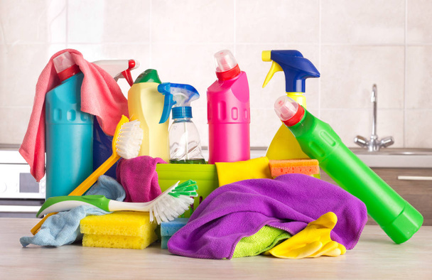 Cleaning products on kitchen table - Photo, Image