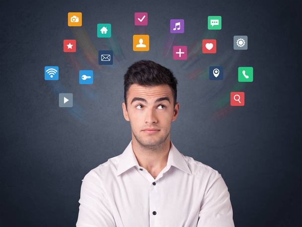 Businessman with colorful apps - Фото, зображення