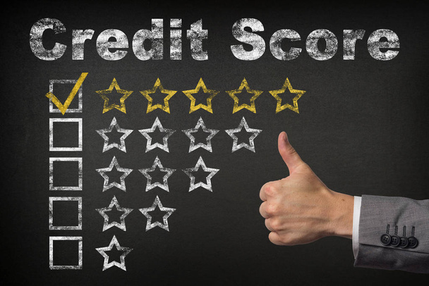 Credit score five 5 star rating. thumbs up service golden rating stars on chalkboard - Valokuva, kuva