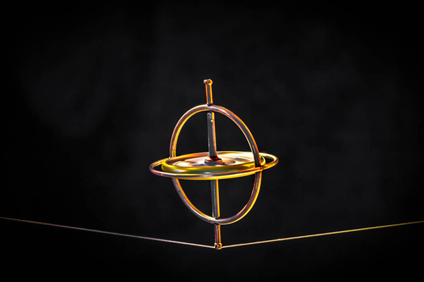 gyroscope jouet équilibrage sur une ligne
 - Photo, image