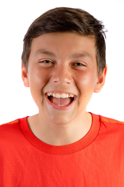 Young teenage boy isolated on white roaring with laughter - Fotoğraf, Görsel