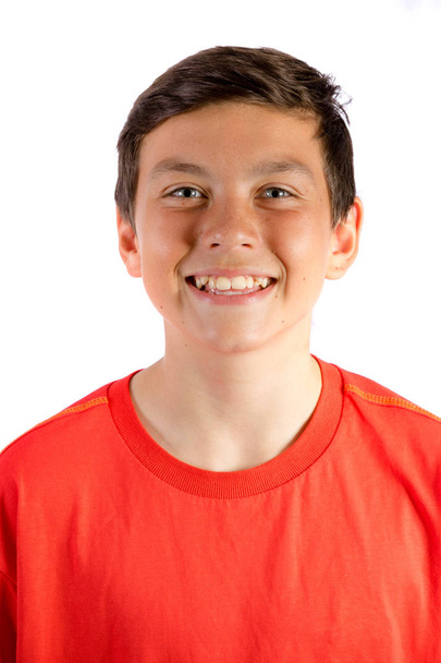 Young teenage boy isolated on white smiling - Φωτογραφία, εικόνα