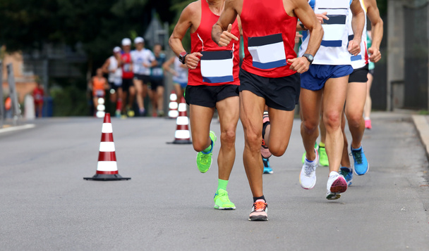 runners with sportswear  during the marathon - Photo, Image