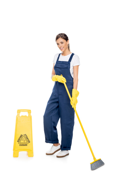 smiling cleaner in uniform with broom - Zdjęcie, obraz
