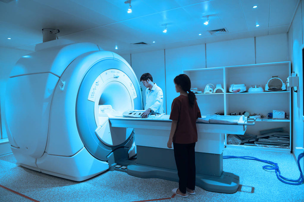 veterinarian doctor working in MRI scanner room  - Фото, зображення
