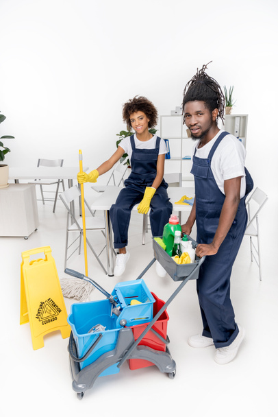 african american cleaners with cleaning equipment - Fotografie, Obrázek