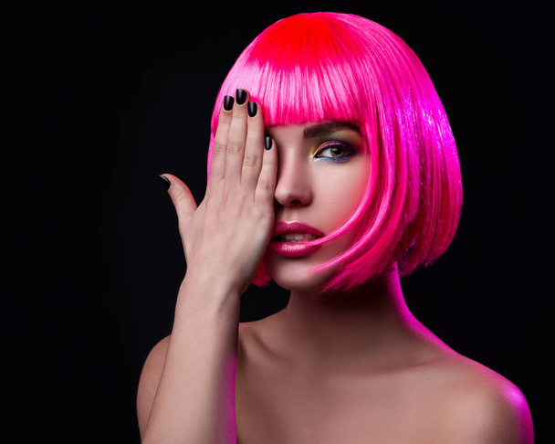 woman with pink hair closing eye  - Foto, afbeelding