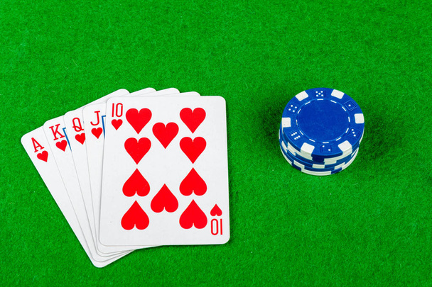 Poker hand Royal Flush Hearts With Betting Chips - Zdjęcie, obraz