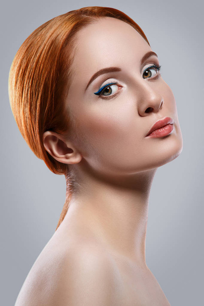 Woman with blue eyeliner - Фото, зображення