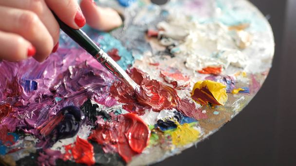 on a pallet stamped colored oil paints, - Fotografie, Obrázek