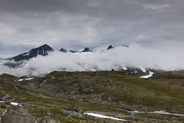 clouds and high mountain peaks - Fotó, kép