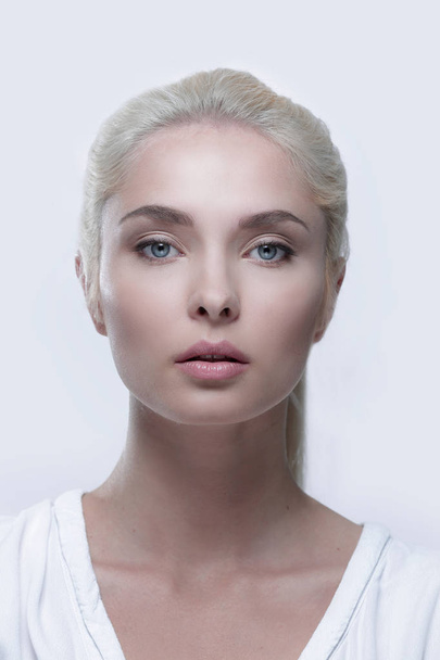 Portrait of a beautiful blond woman with daily make-up - Фото, изображение