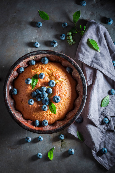 Tasty and sweet blueberries cake made of fresh ingredients - Photo, image