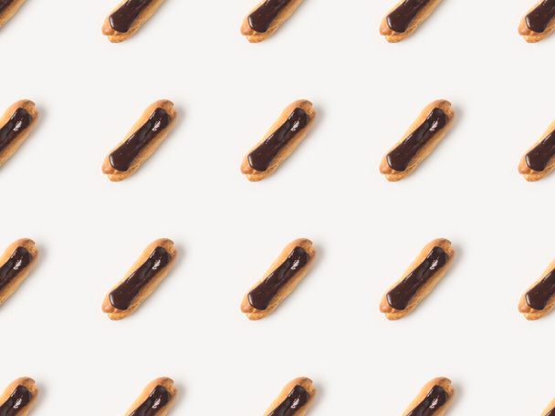 homemade eclairs with chocolate ganache  - Фото, изображение