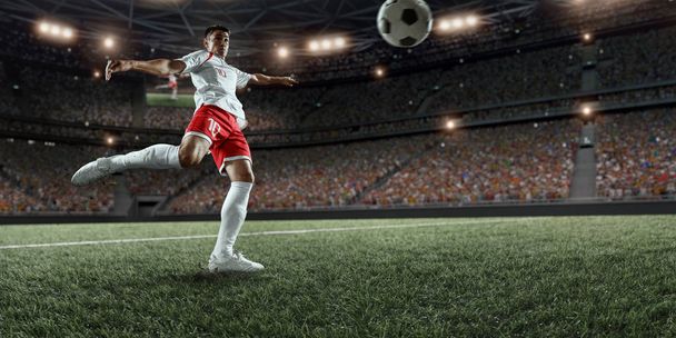 Jugador de fútbol anotando un gol
 - Foto, Imagen