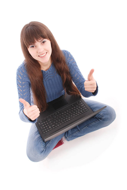 ノート パソコン少女 Pc のコンピューターで座っている成功のサインを親指を与える幸せ - 写真・画像