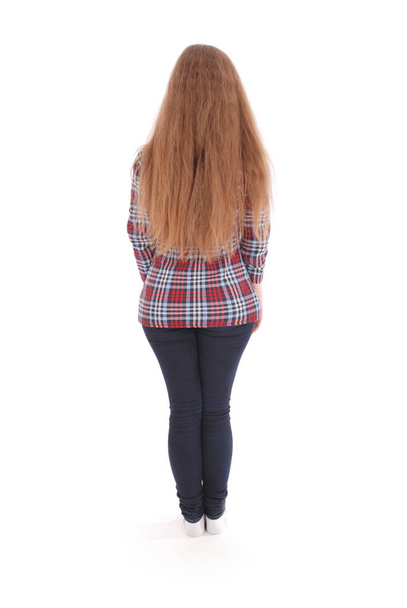 Vista posterior de pie chica gorda joven
 - Foto, Imagen
