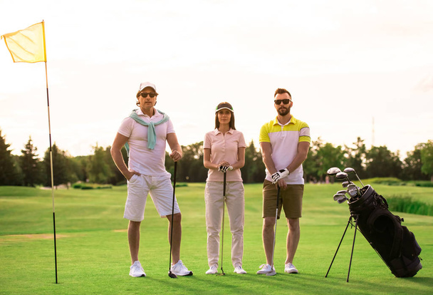 Golf oynayanlar - Fotoğraf, Görsel