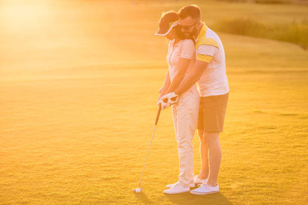 Couple playing golf - Photo, Image