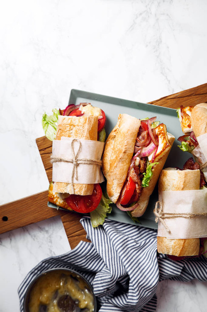 Bahn-mi styled baguette sandwich - Фото, изображение