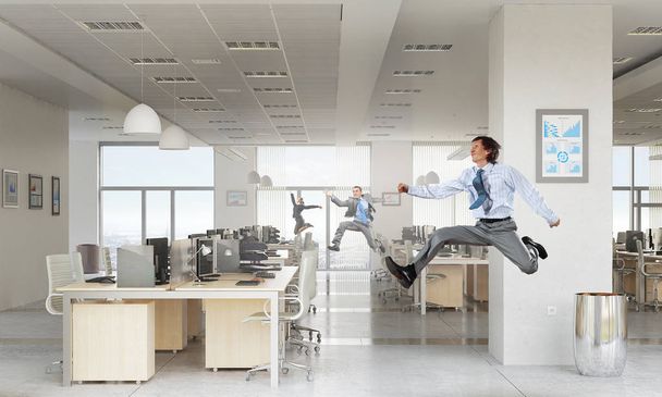 Dancing businesspeople in office room - Fotó, kép