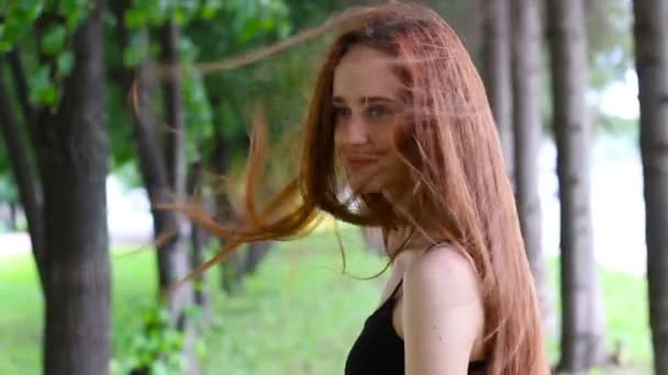 Portrait of beautiful young woman with long hair. - Felvétel, videó