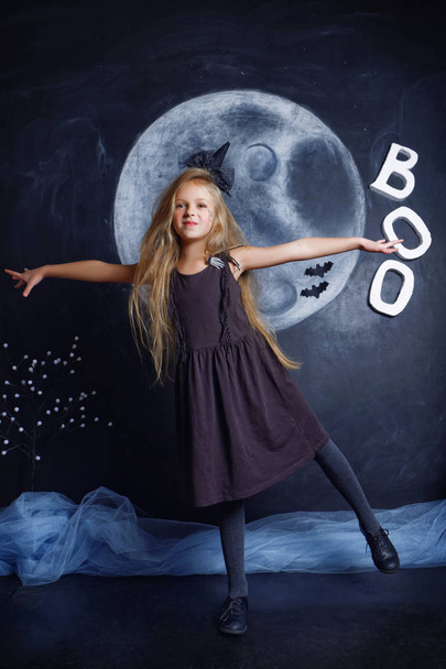 Beautiful little girl in Halloween witch costume - Zdjęcie, obraz