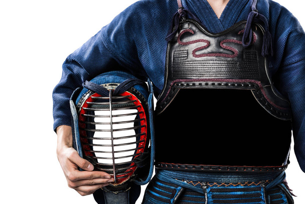 male in tradition kendo armor with shinai (bamboo sword). - Фото, зображення