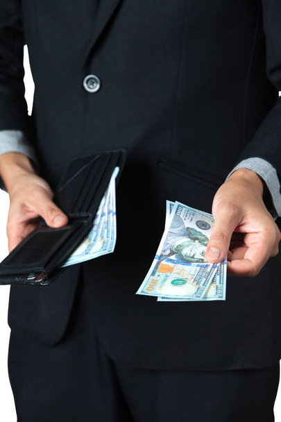 The businessman took dollar out of his wallet for pay or donation with white background. - Foto, immagini