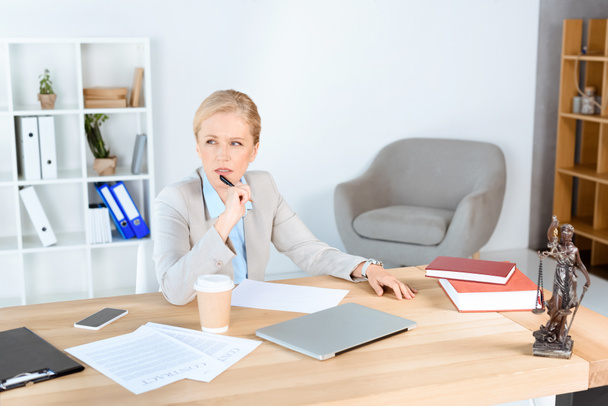 mature businesswoman at workplace - Photo, Image