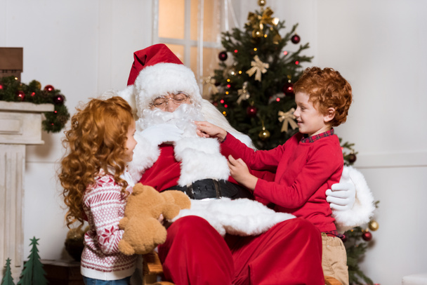 santa claus and little siblings - Photo, Image