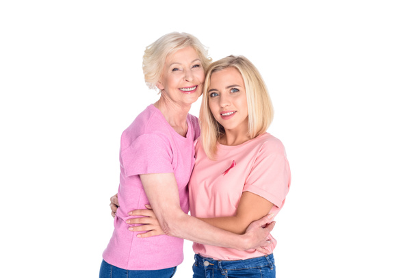 women in pink t-shirts hugging - Photo, Image